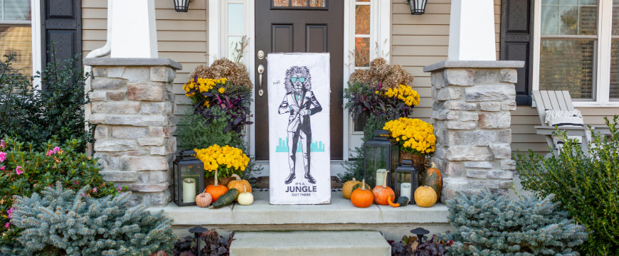 House porch decorated for the fall season with an Original Lull Mattress Box in the center.