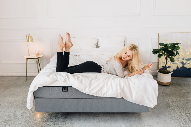 Woman on Original Lull Mattress and Foundation