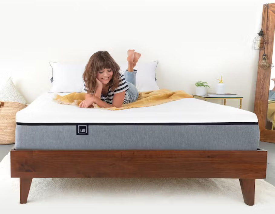 Woman on Original Lull Mattress and Gaviota Wood Frame