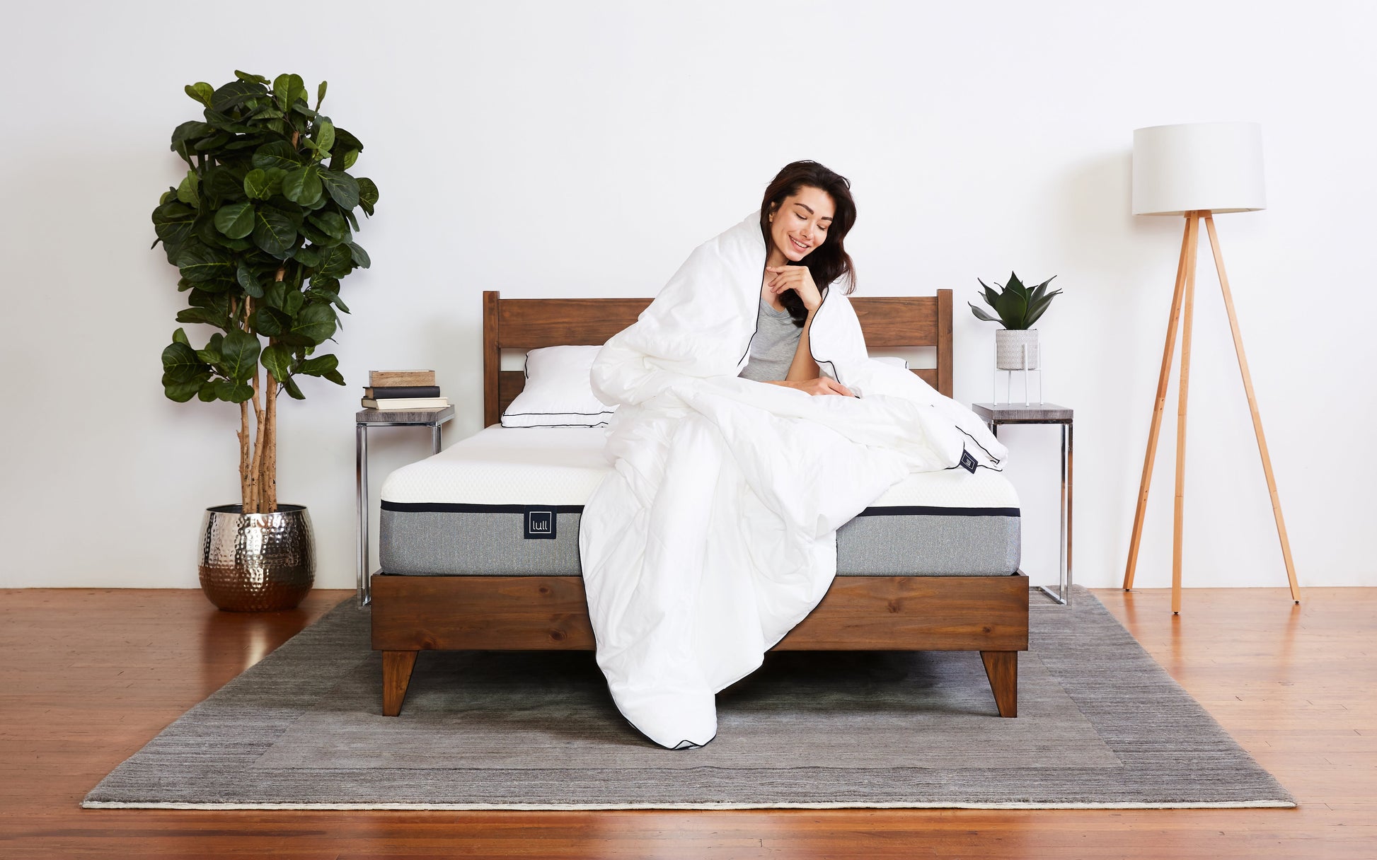Original Lull Duvet draped over woman