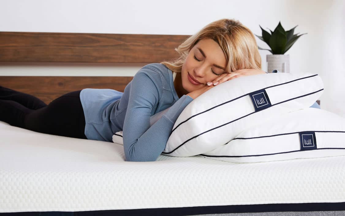 Woman sleeping on Original Lull Pillows