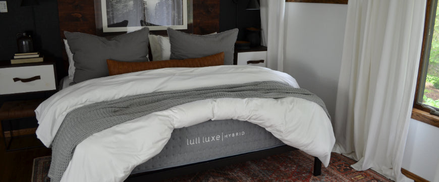 Lull Luxe Hybrid mattress in a styled bedroom