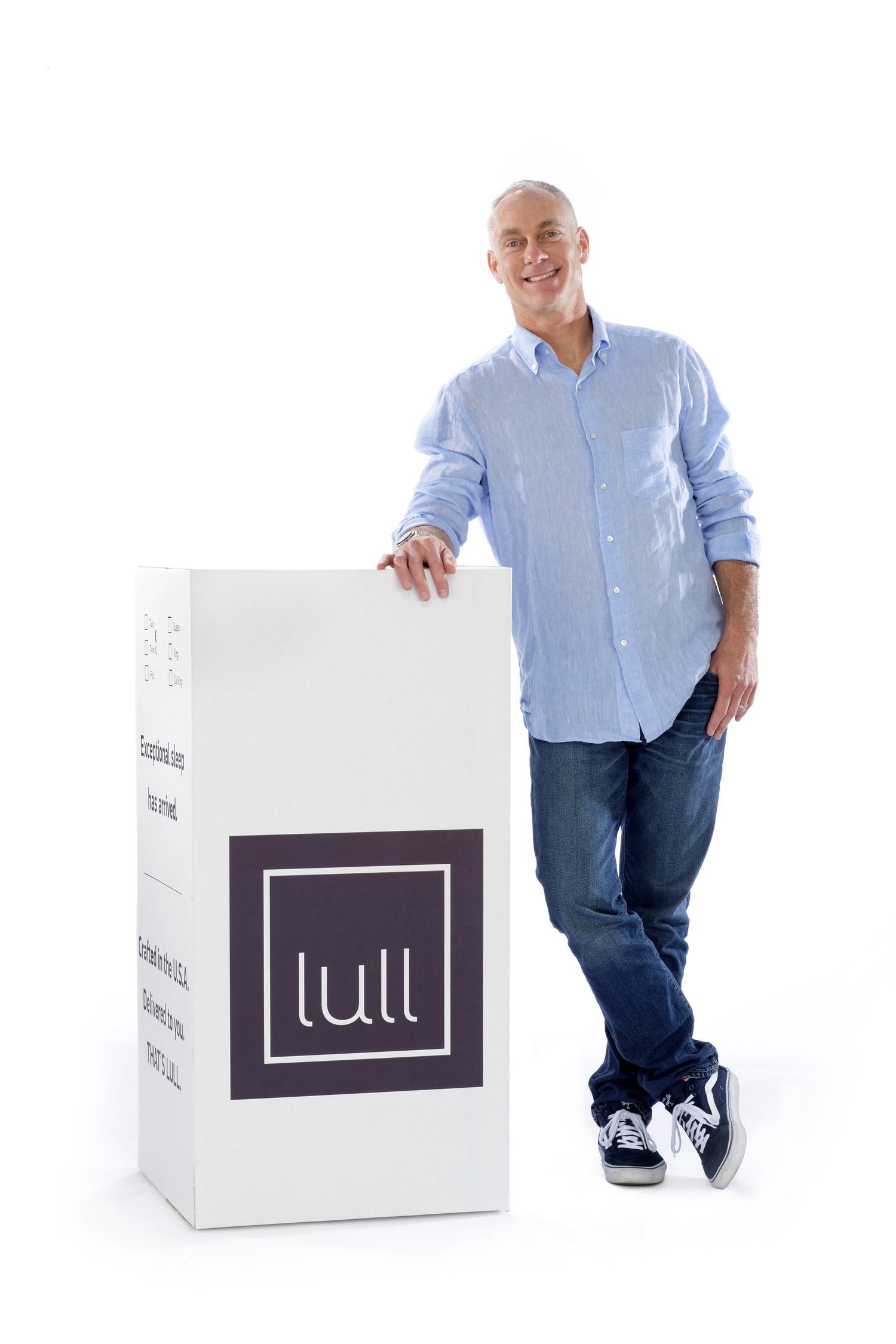 Sven, a founder of lull, leaning against a mattress box.
