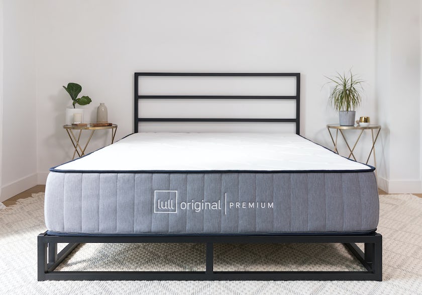 The Lull Original Premium Mattress on a bed metal bed frame in a bedroom.