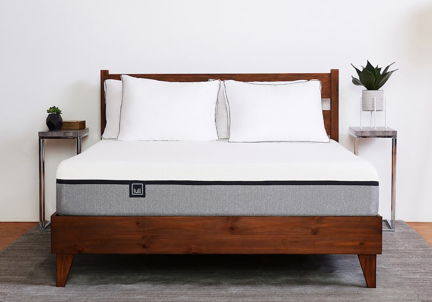 The Original Lull Mattress on a bed frame with pillow.