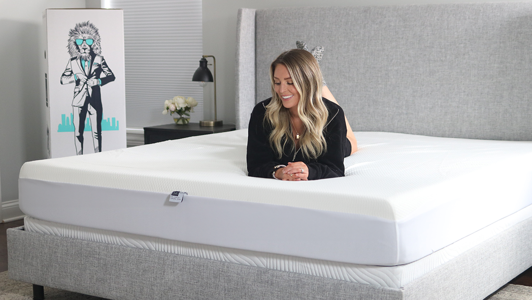 Lull Mattress Protector with woman