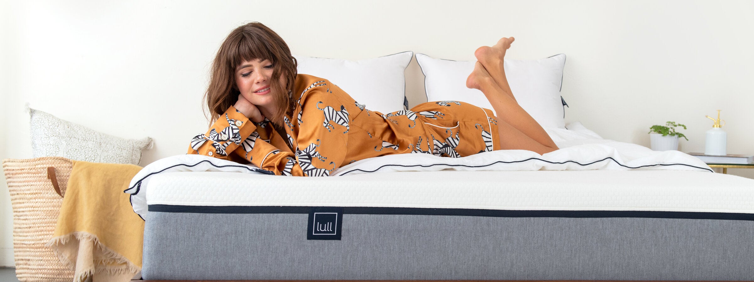 Woman sleeping comfortably on a Lull mattress